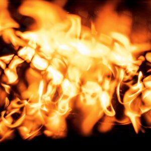 a close up of a fire in a grill